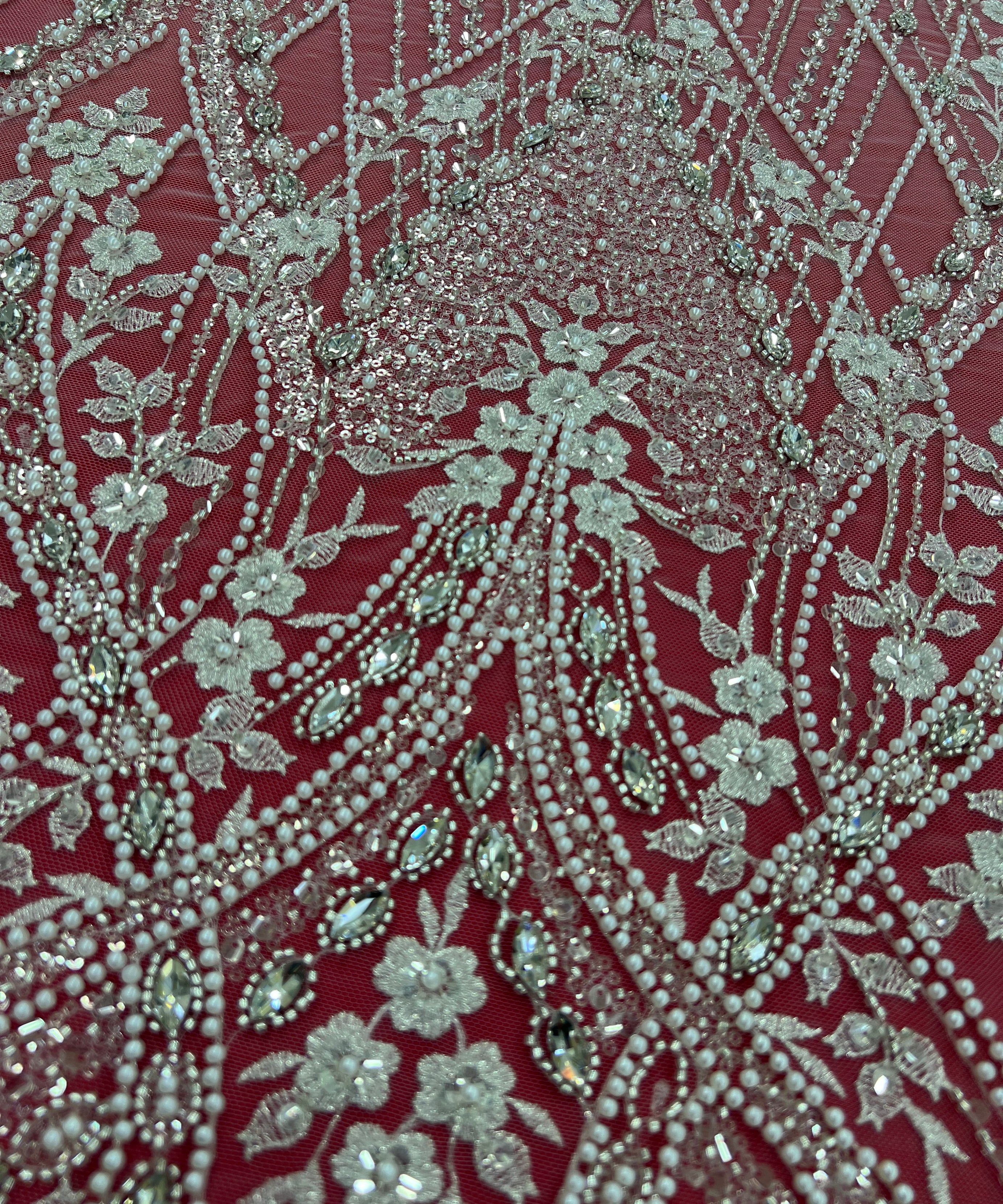 Luxurious embroidered lace with geometric and floral patterns