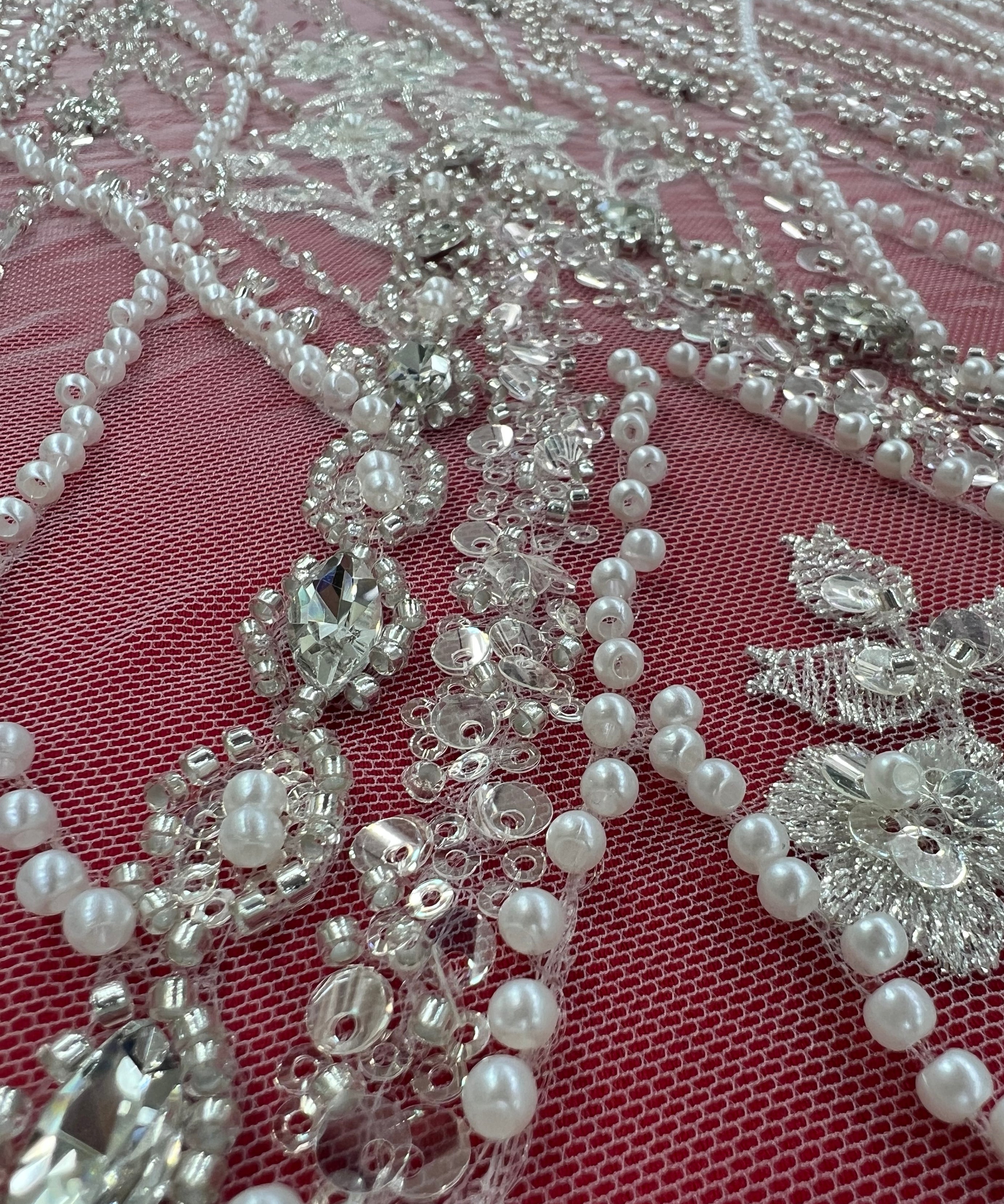 Luxurious embroidered lace with geometric and floral patterns