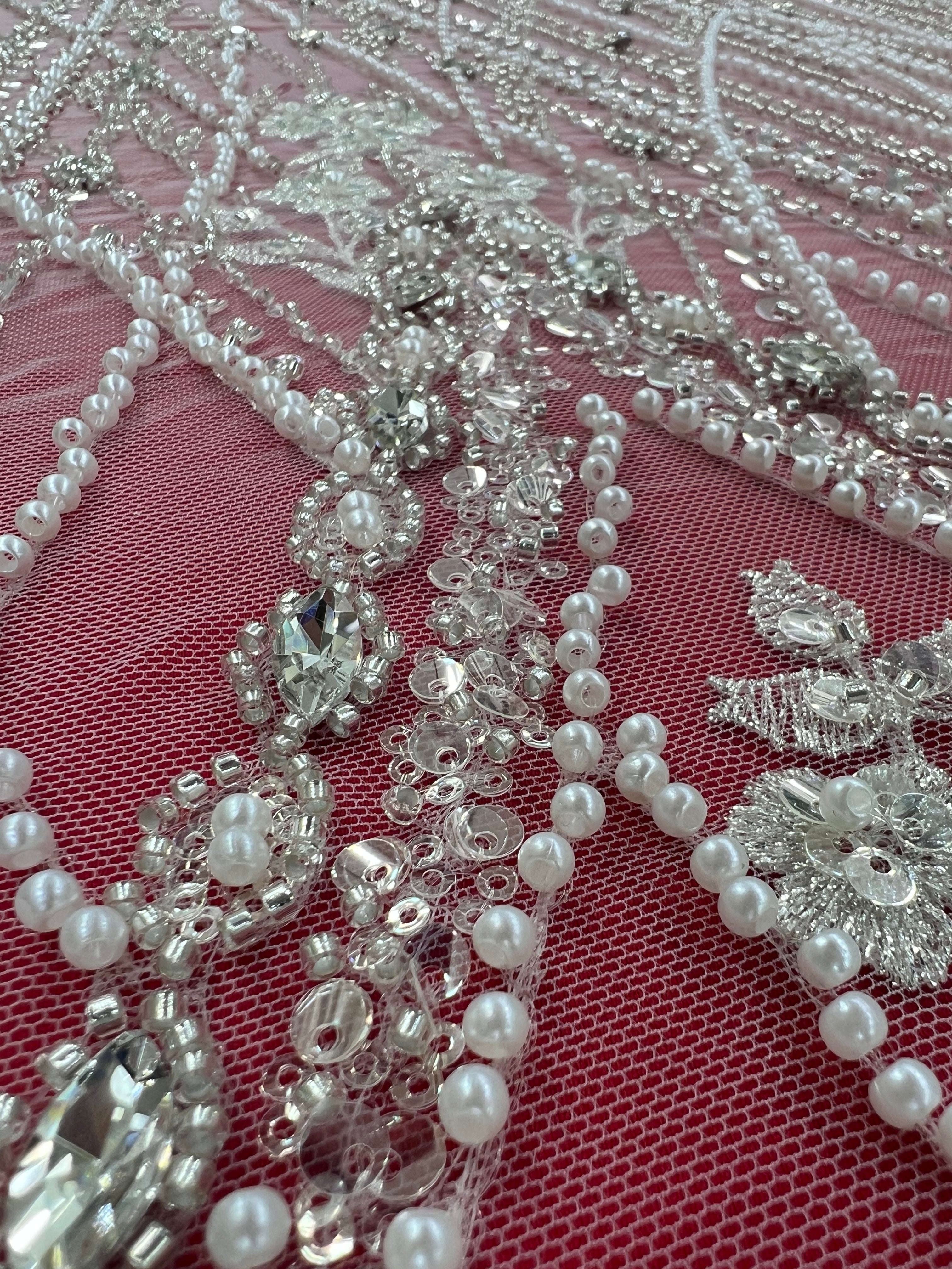 Luxurious embroidered lace with geometric and floral patterns