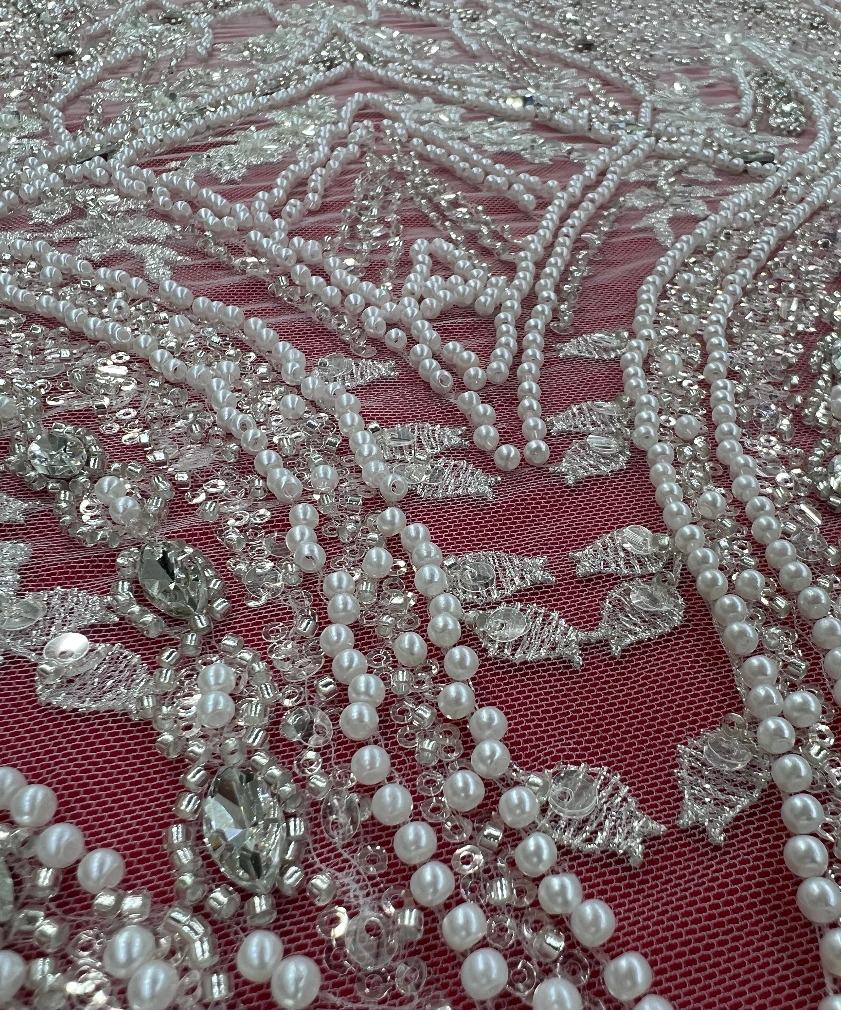 Luxurious embroidered lace with geometric and floral patterns