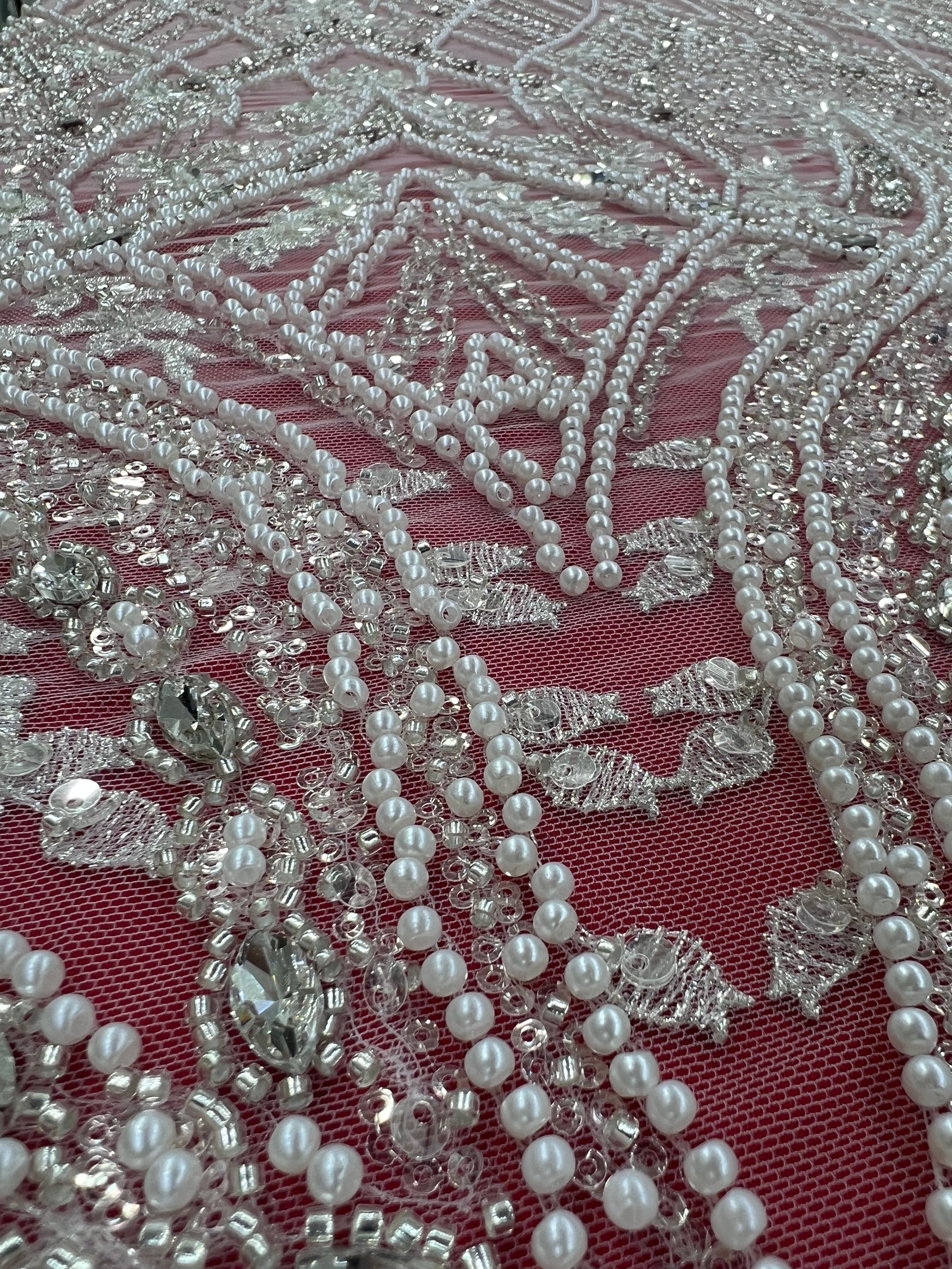 Luxurious embroidered lace with geometric and floral patterns