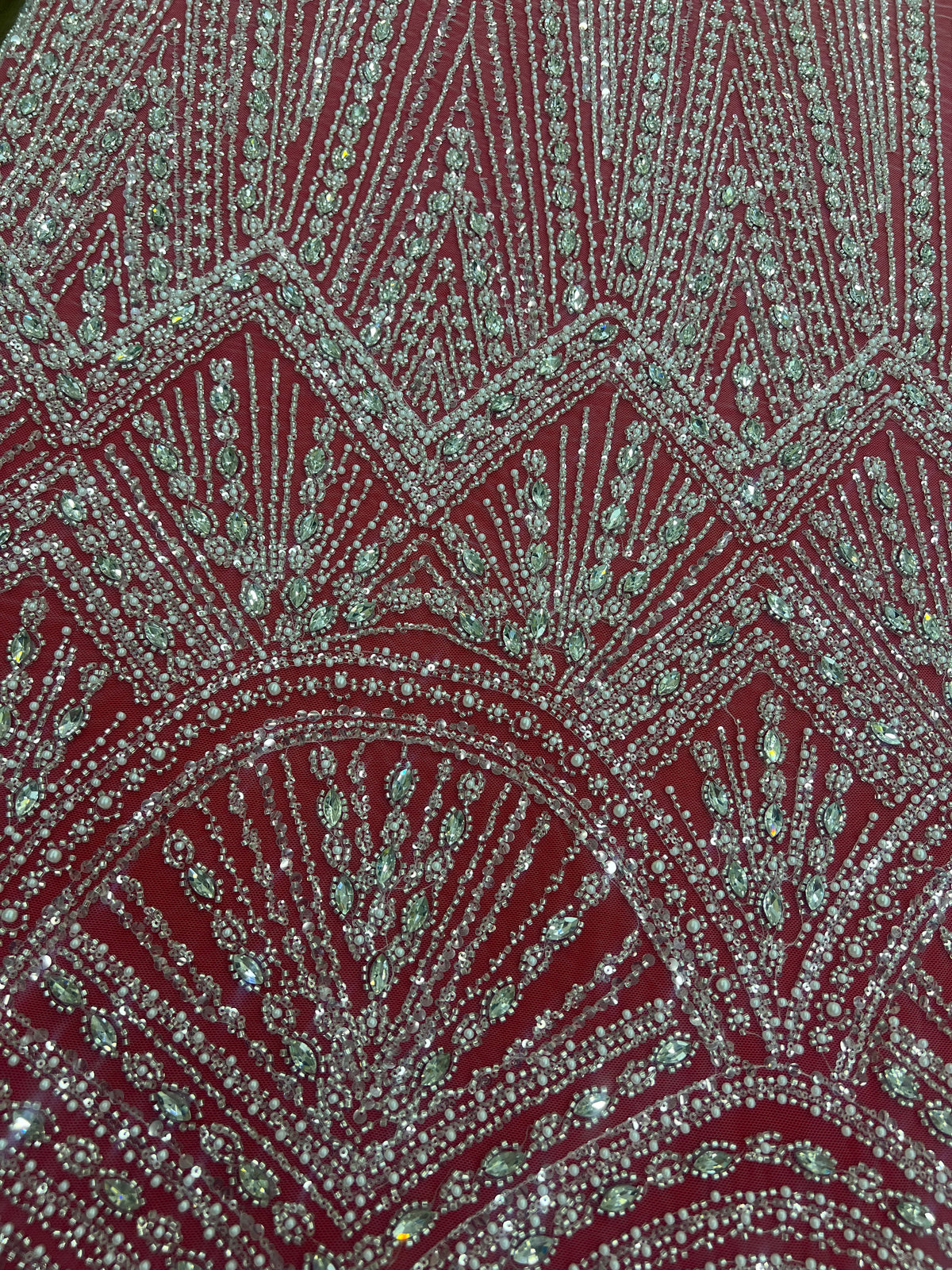 Luxurious embroidered lace with beads and crystals in a cascading geometric design
